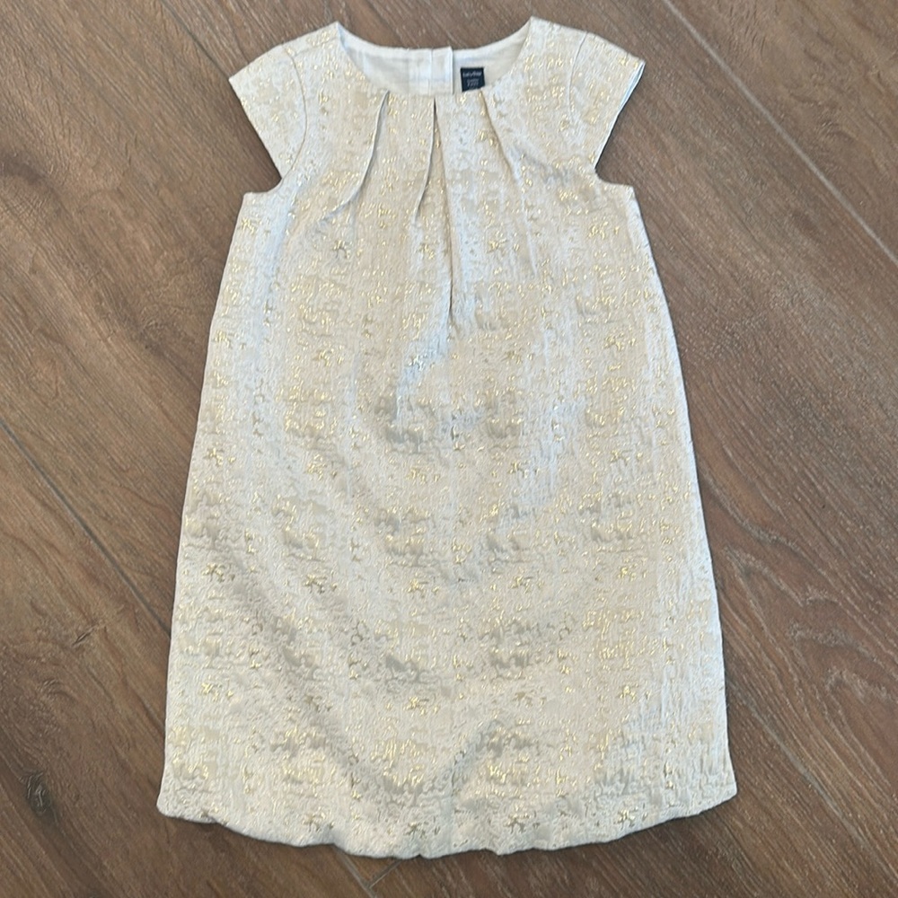 Baby Gap girls dress. Color beige with gold pattern.